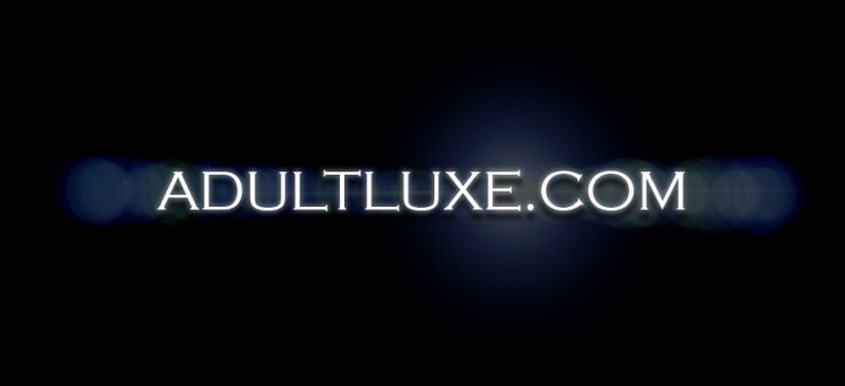 adultluxe.com name with spot lights behind it.